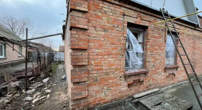 понівечені будинки