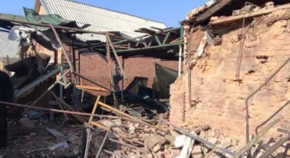 понівечені будинки